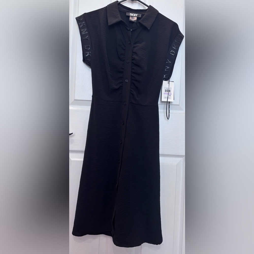 DKNY NWT women's black size 6 collared dress with logo detail on the sleeves.